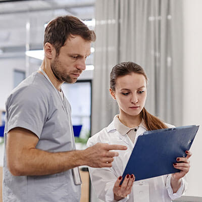 young-female-general-practitioner-showing-medica.jpg